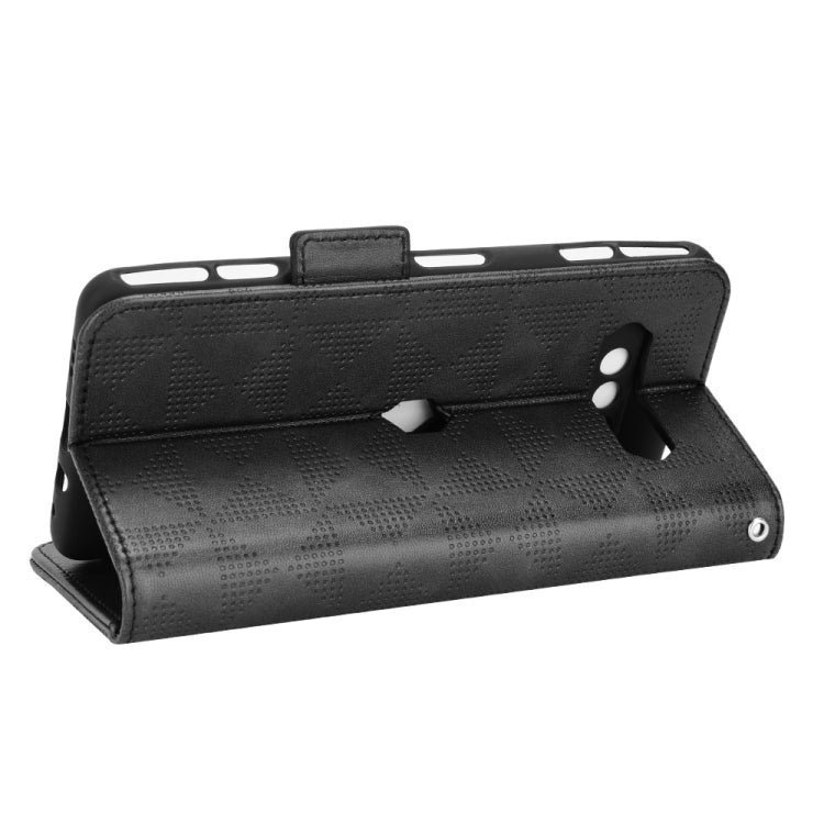 Black leather-look folio case with textured pattern and fold-out stand for viewing