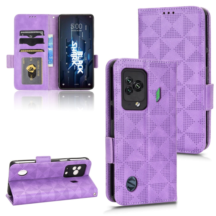 Purple leather phone case with camera cutouts and side buttons, geometric diamond texture.