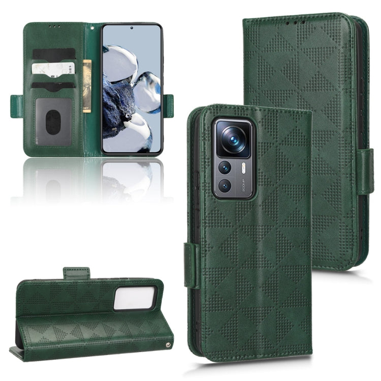 Green leather phone case with textured triangle pattern, card slots, and magnetic closure.