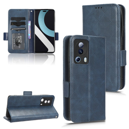 Blue leather-look folio phone case with symmetrical triangle pattern and magnetic closure flap