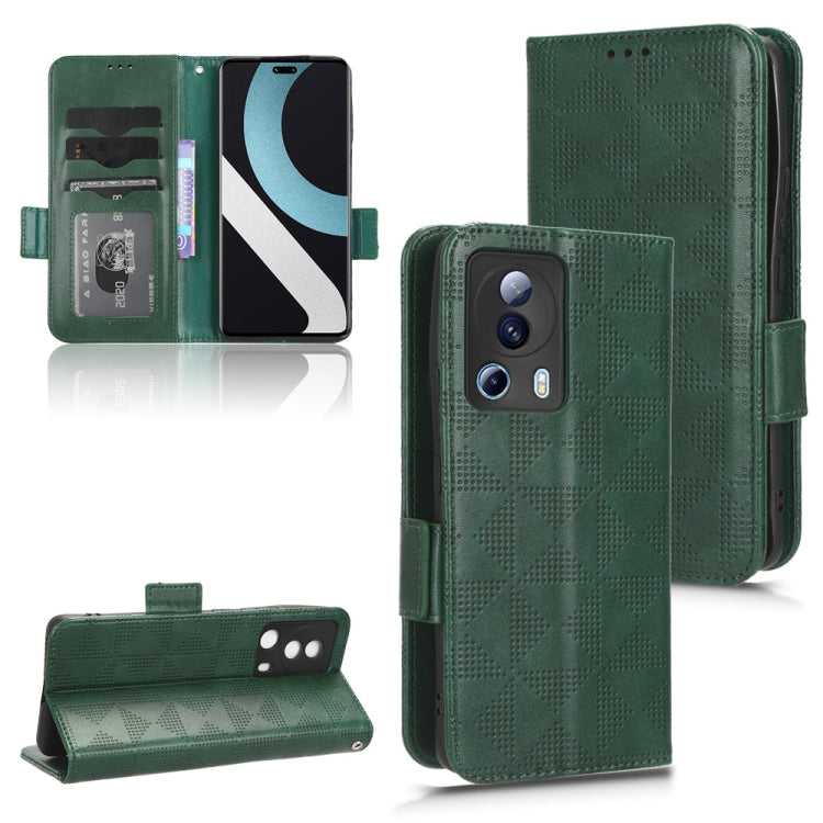 Green leather wallet phone case with triangle texture, camera cutout, and magnetic flap.