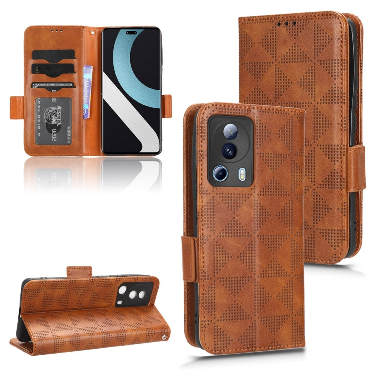 Brown leather folio phone case with symmetrical triangle pattern and card slots