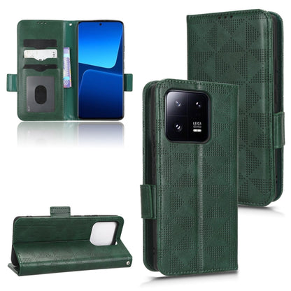 Green leather wallet phone case with triangle pattern, camera window, and magnetic closure.