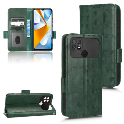 Green leather phone case with embossed triangle pattern, card slots, and magnetic strap.