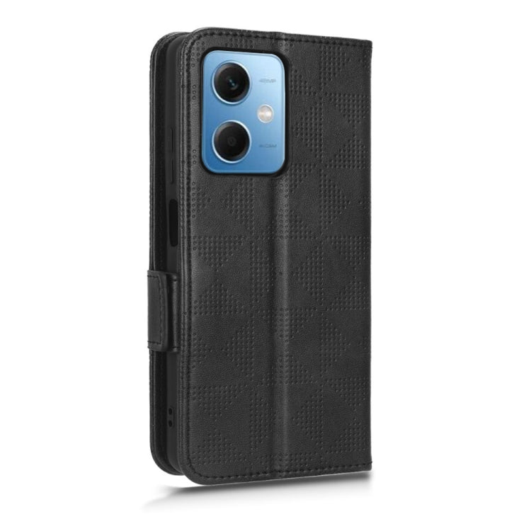 Black leather phone wallet case with diamond texture, side flip cover and cutout openings.