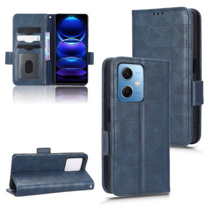 Blue leather phone wallet case with diamond texture, magnetic flap, card slots, and stand.