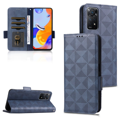 Blue leather folio phone case with symmetrical triangle pattern, card slots, and stand