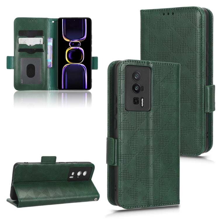 Green leather folio phone case with symmetrical triangle pattern and side strap