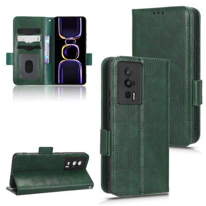 Green leather folio phone case with symmetrical triangle pattern and side strap