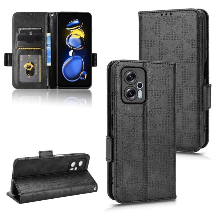 Black leather folio phone case with symmetrical triangle pattern and card slots