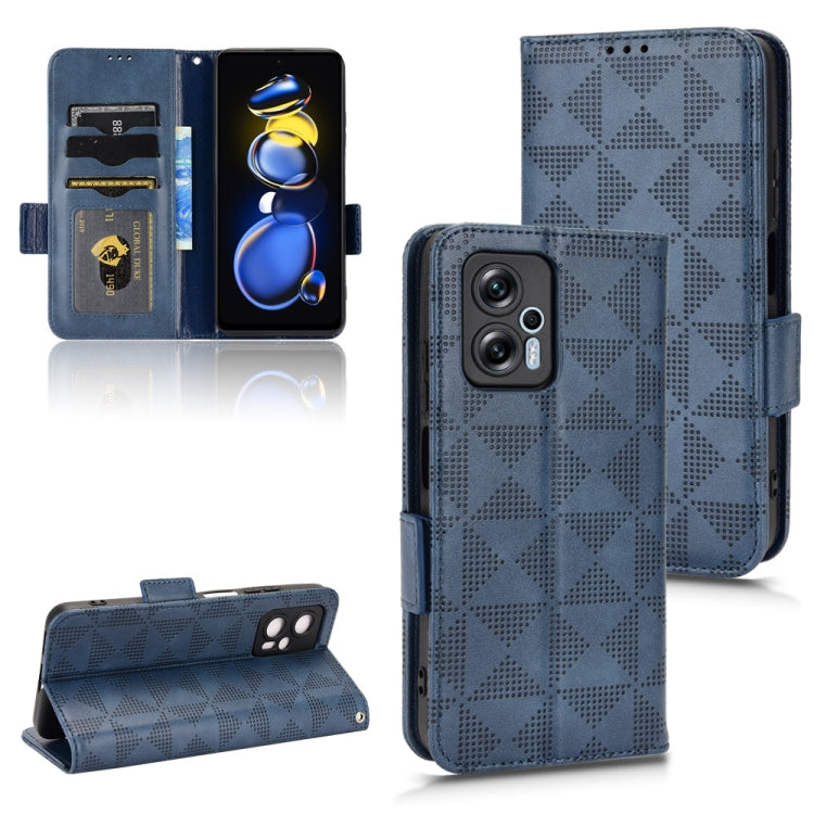Blue leather phone case with geometric pattern, card slots, and flip stand support.