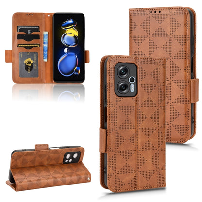 Brown leather phone case with geometric pattern, card slots, and flip stand support.