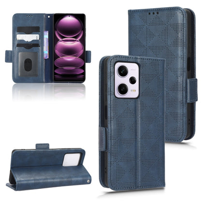 Blue folio phone case with symmetrical triangle embossed pattern and card slots