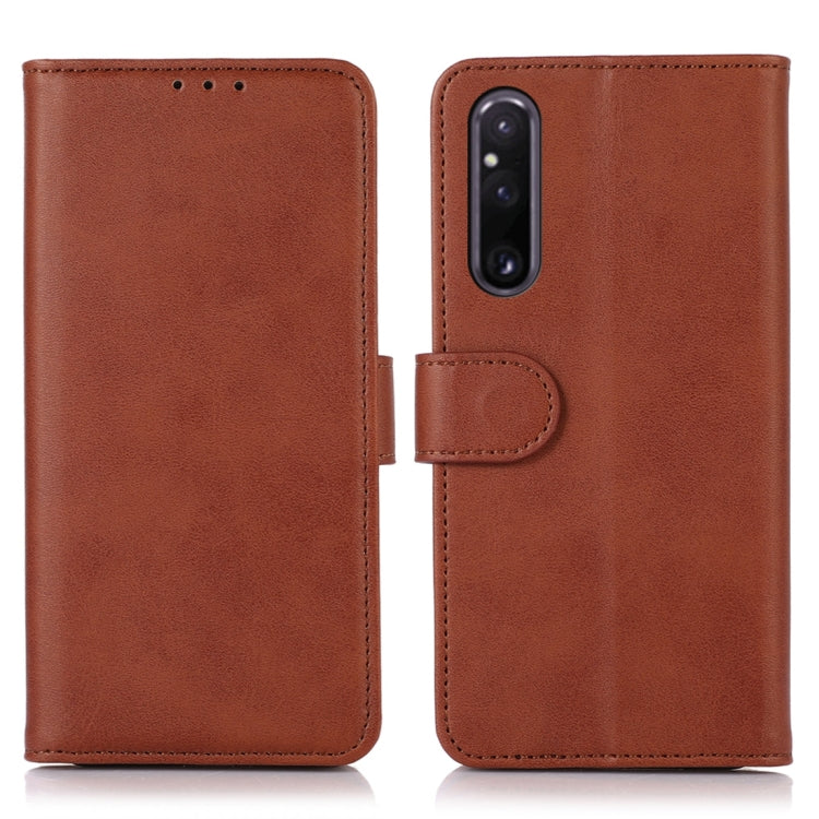 Brown cow-texture leather folio phone case with flip cover and camera cutout