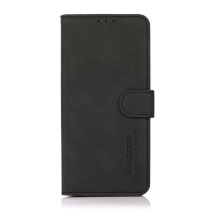Black matte leather folio phone case with magnetic strap, front cover closed.