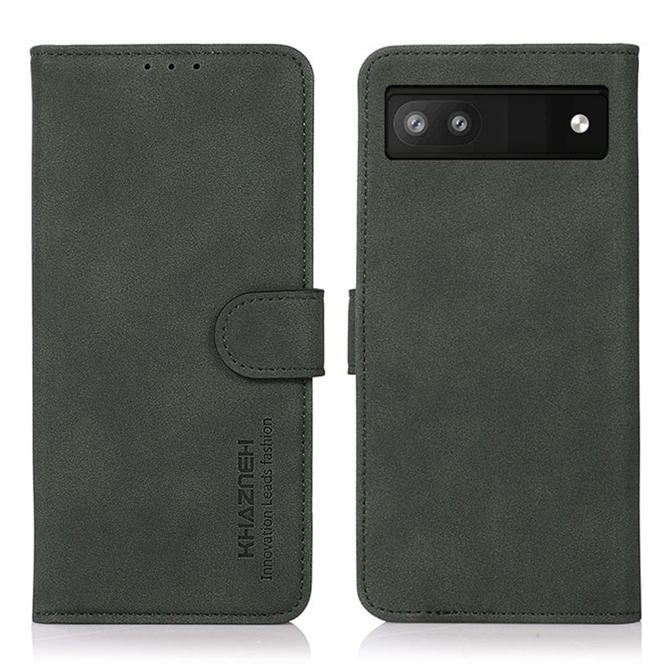 Matte green leather phone case with flip cover and holder strap; horizontal camera cutout.