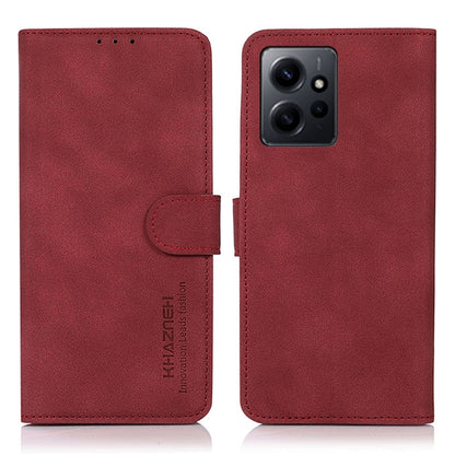 Matte red leather phone case with flip cover and holder strap; square triple-camera cutout.