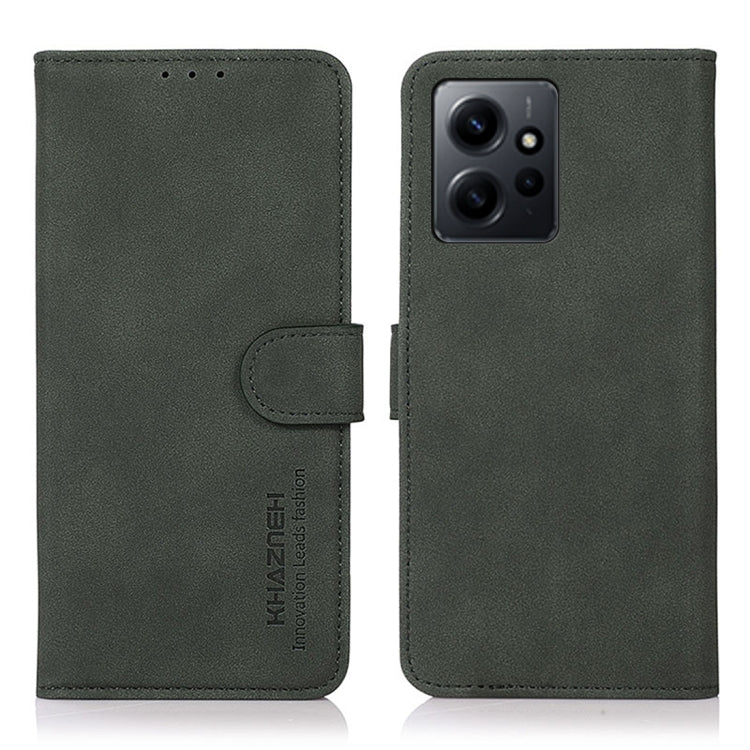 Matte green leather phone case with flip cover and holder strap; square triple-camera cutout.