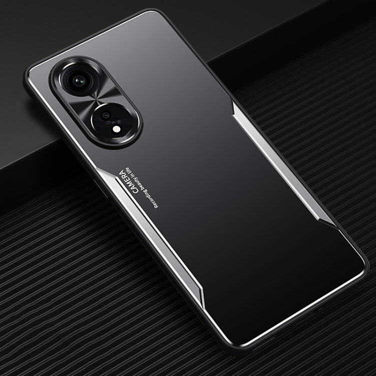 Phone case in black with silver accents, dual camera cutouts and raised edge protection.