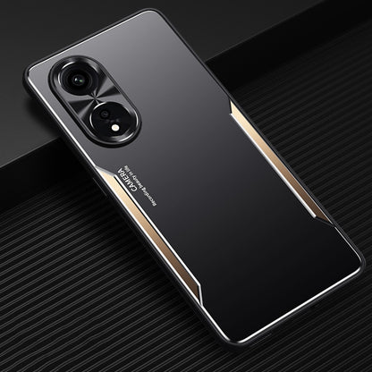 Phone case in black with gold accents, dual camera cutouts and raised edge protection.