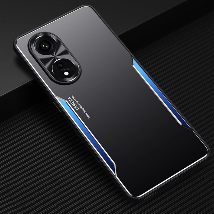 Phone case in black with blue accents, dual camera cutouts and raised edge protection.