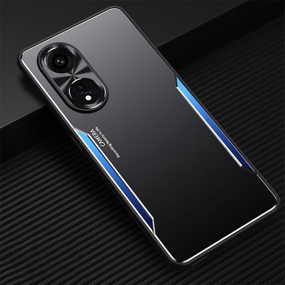 Phone case in black with blue accents, dual camera cutouts and raised edge protection.