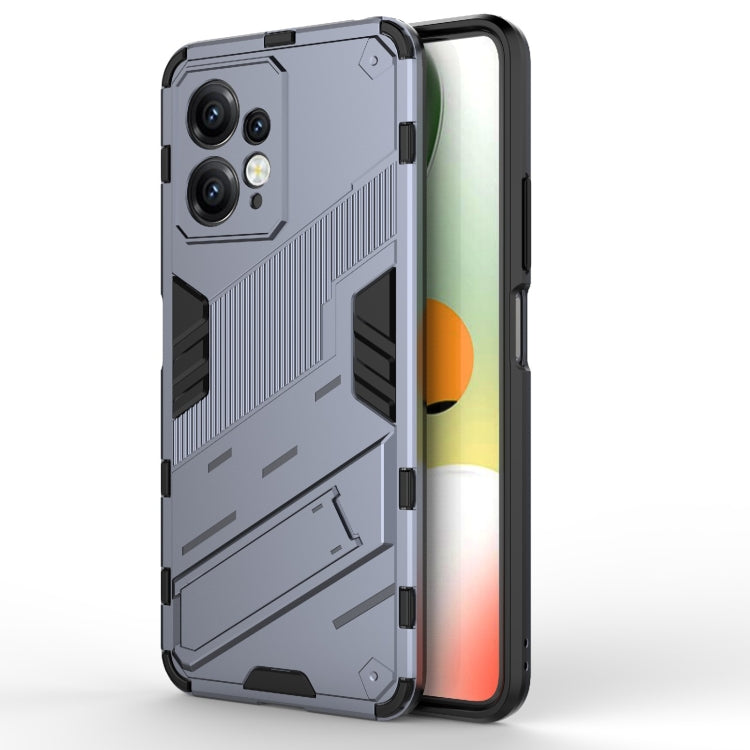 Grey rugged phone case with black accents and camera cutouts in an armor-style pattern.