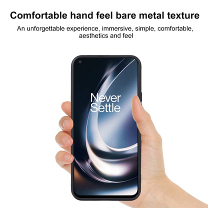 Black TPU phone case held in hand, front and back with camera opening