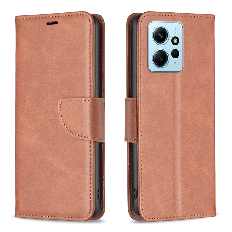 Brown lambskin phone case with folio flap and card holder; cutouts for ports and camera