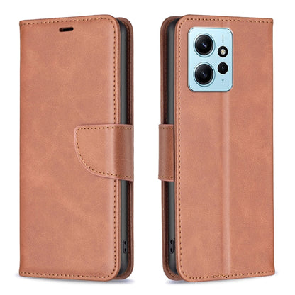 Brown lambskin phone case with folio flap and card holder; cutouts for ports and camera