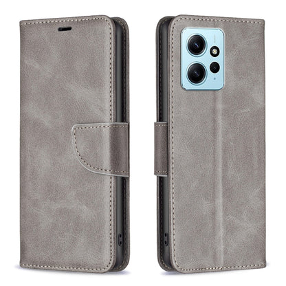 Grey lambskin folio phone case with side strap and card holder; camera and port cutouts