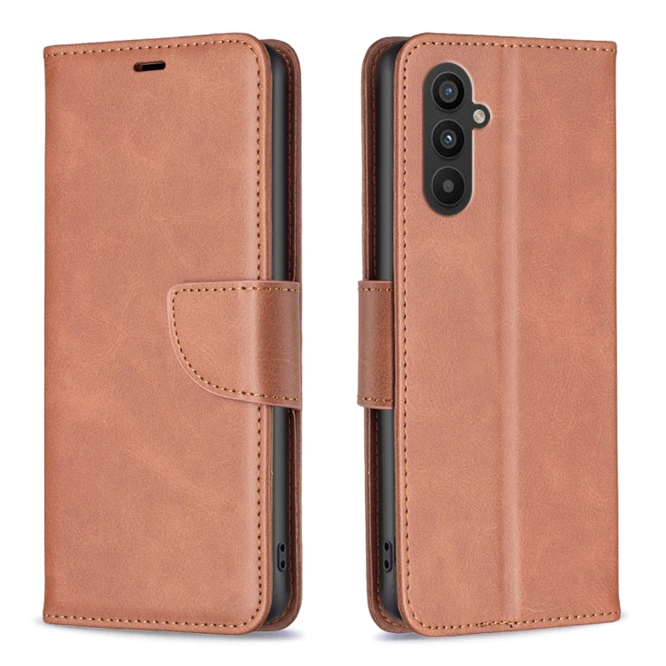Tan/brown lambskin folio phone case with side strap and card holder; camera cutout
