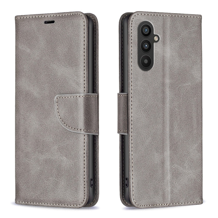 Light grey lambskin folio phone case with side strap and card holder; camera cutout