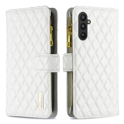 White leather flip phone case with diamond lattice texture, zipper, and card slot