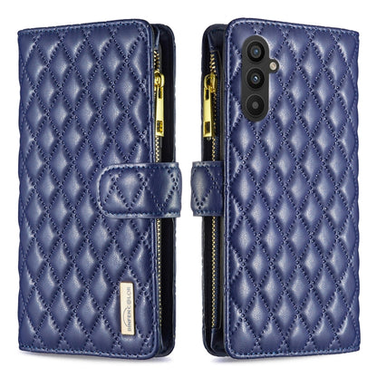 Blue leather flip phone case with diamond lattice texture, zipper, and card slot