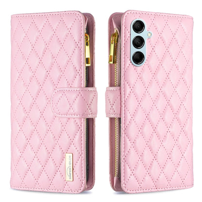 Pink leather flip phone case with diamond lattice texture, zipper, and card slot