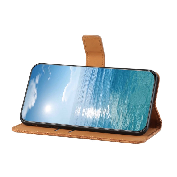 Tan leather-style flip phone case with embossed pattern, folded for tabletop viewing