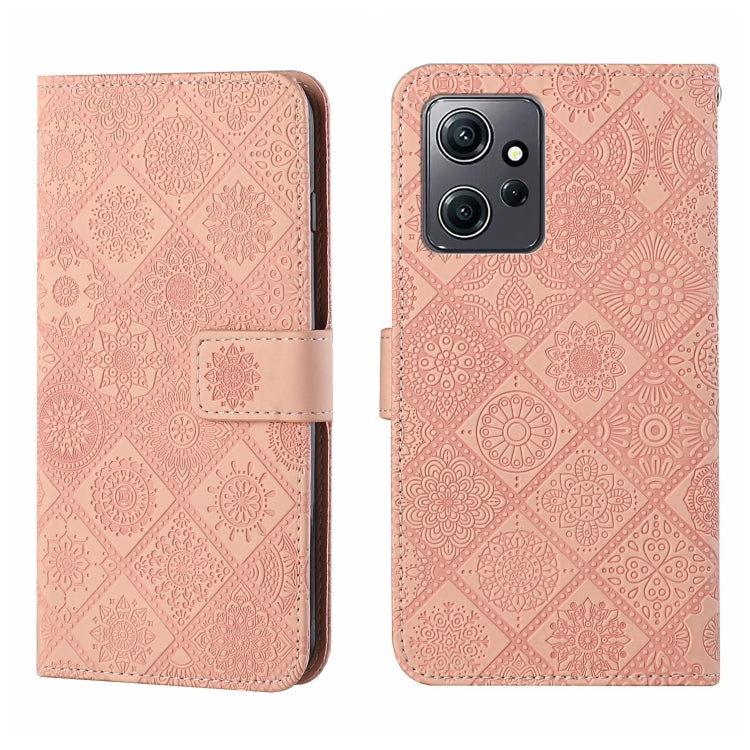 Pink embossed pattern leather wallet-style phone case with magnetic strap and cutouts