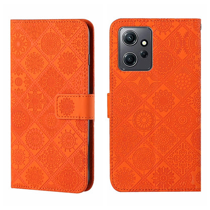 Orange embossed pattern leather wallet-style phone case with magnetic strap and dual camera cutout