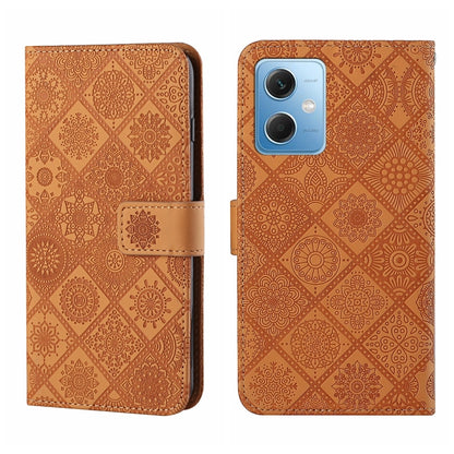 Brownish tan embossed pattern leather wallet-style phone case with magnetic strap and camera cutout