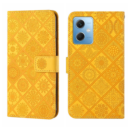 Yellow embossed pattern leather wallet-style phone case with magnetic strap and rear camera opening