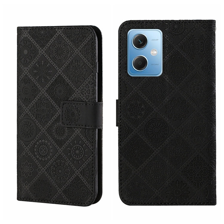 Black embossed leather-style phone case with side flip and card holder