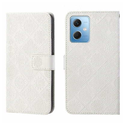 White embossed leather-style phone case with side flip and card holder