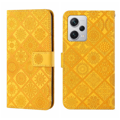 Yellow embossed leather-style phone case with side flip and card holder