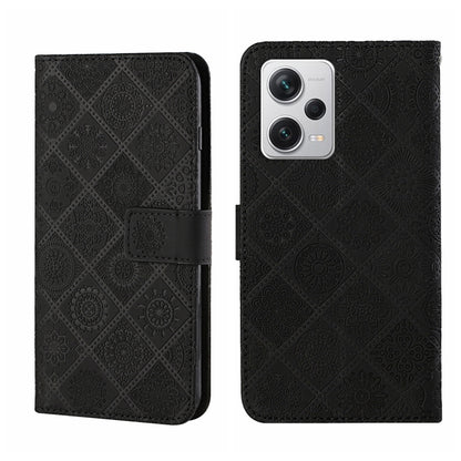 Black embossed leather-style phone case with flip cover and camera cutout