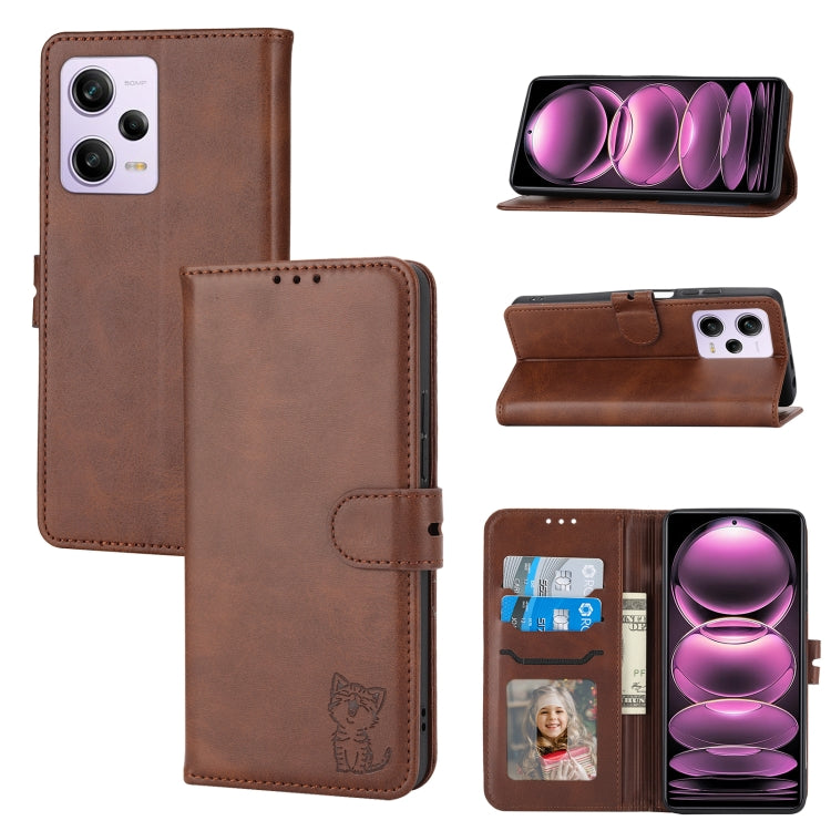 Brown flip leather phone case, embossed cat on flap, card slot and phone cutouts.