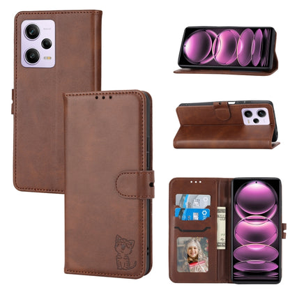 Brown flip leather phone case, embossed cat on flap, card slot and phone cutouts.