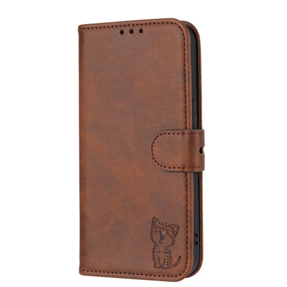 Brown leather flip phone case with stitched edges and embossed cat detail
