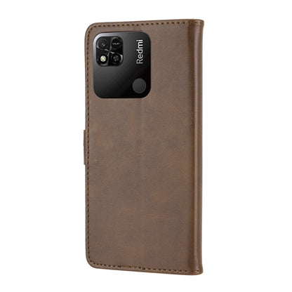 Brown leather flip phone case with camera cutout and embossed cat accent