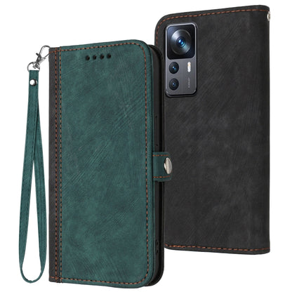 Leather phone case with wrist strap, double-fold design; dark green front and black back.